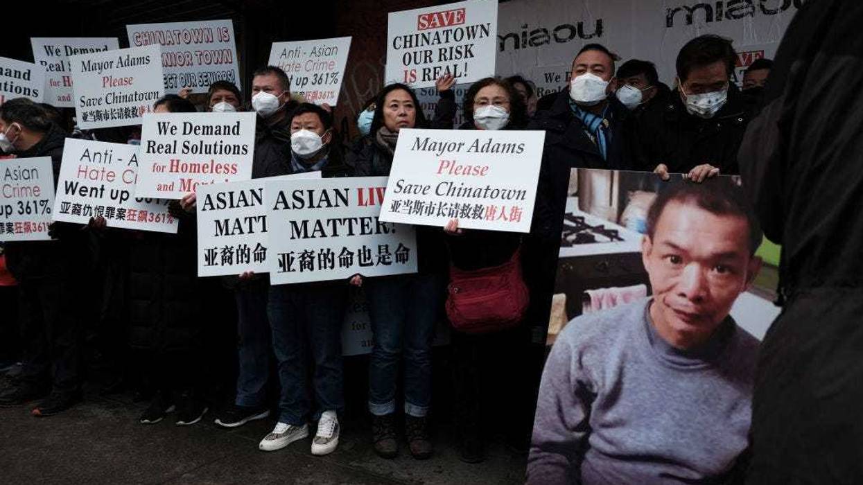 Residents join community and business leaders for a rally in Chinatown to denounce recent acts of violence against Asian-Americans on January 20, 2022 in New York City.