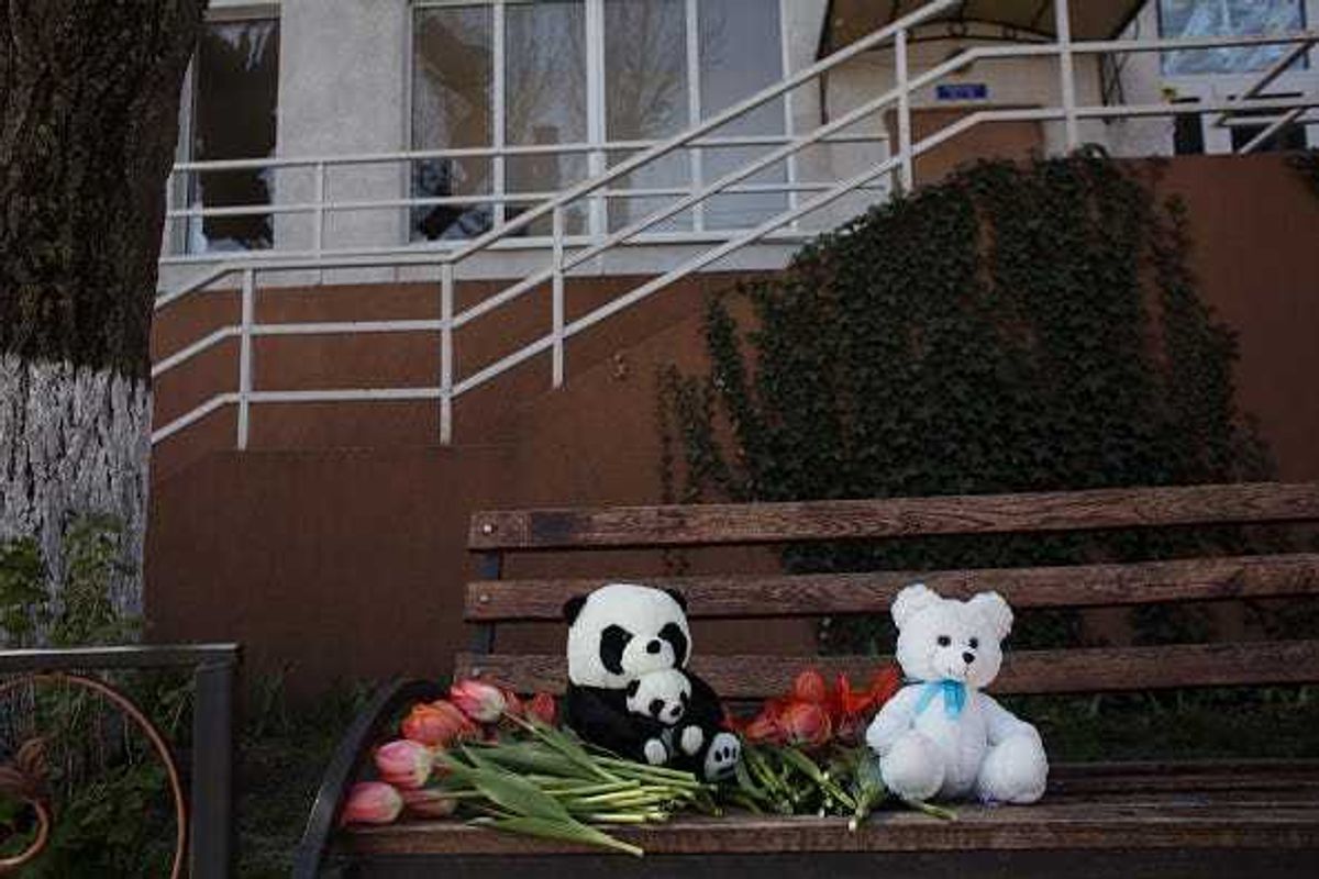 Residents lay toys and flowers in remembrance of Valeriya Galdan and her 3 month old daughter who died as a result of a rocket strike on a residential building on April 24, 2022 in Odessa, Ukraine.