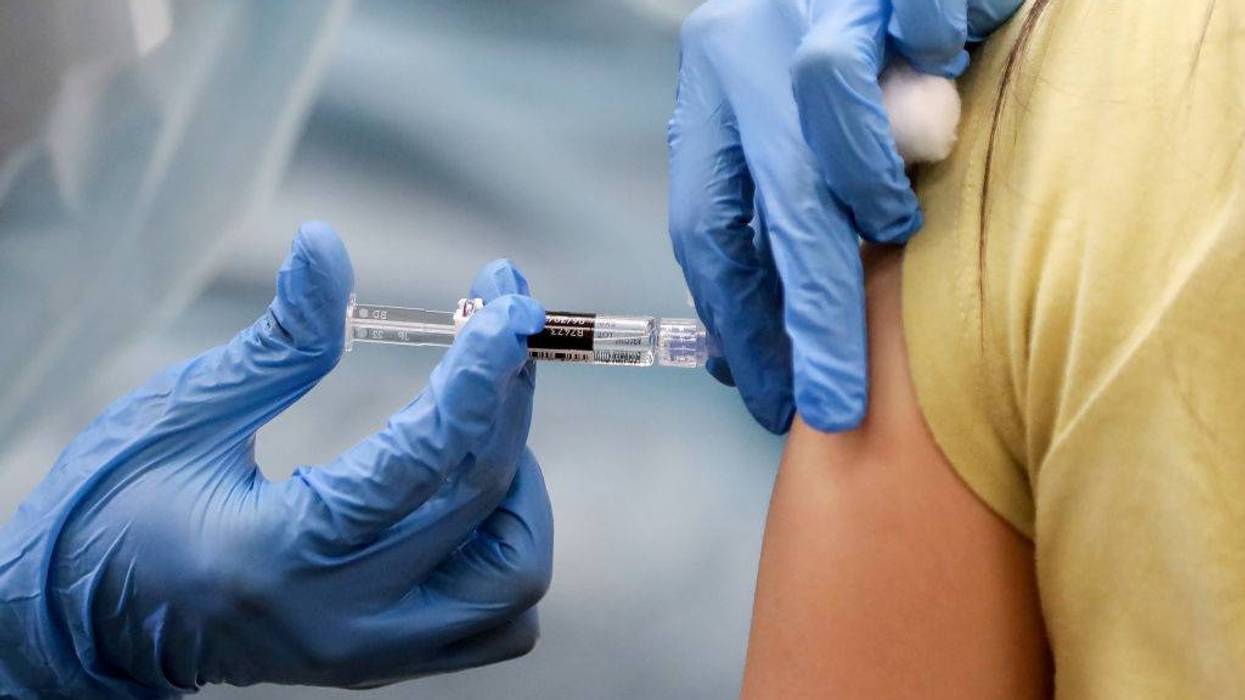 Residents Line Up For Flu Shots At Local Library