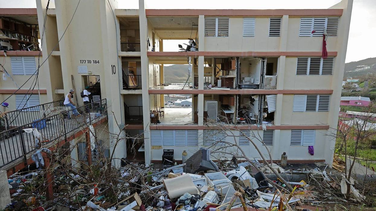 Residents' possessions are shredded and scattered outside the Tutu High Rise more than a week after Hurricane Irma destroyed the building in September 2017. With sustained winds at 150mph, Irma blew completely through the building, killing a woman when she was sucked out of her home.