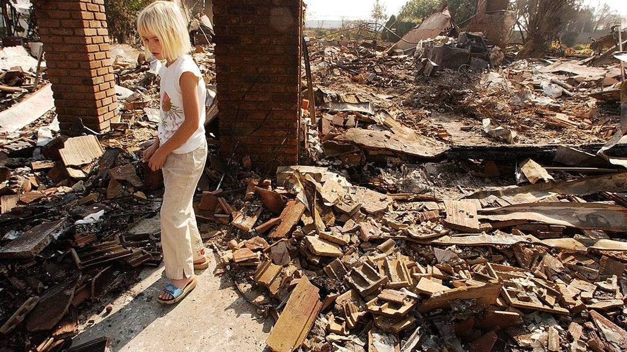Residents return to their homes destroyed by wildfires in San Diego.