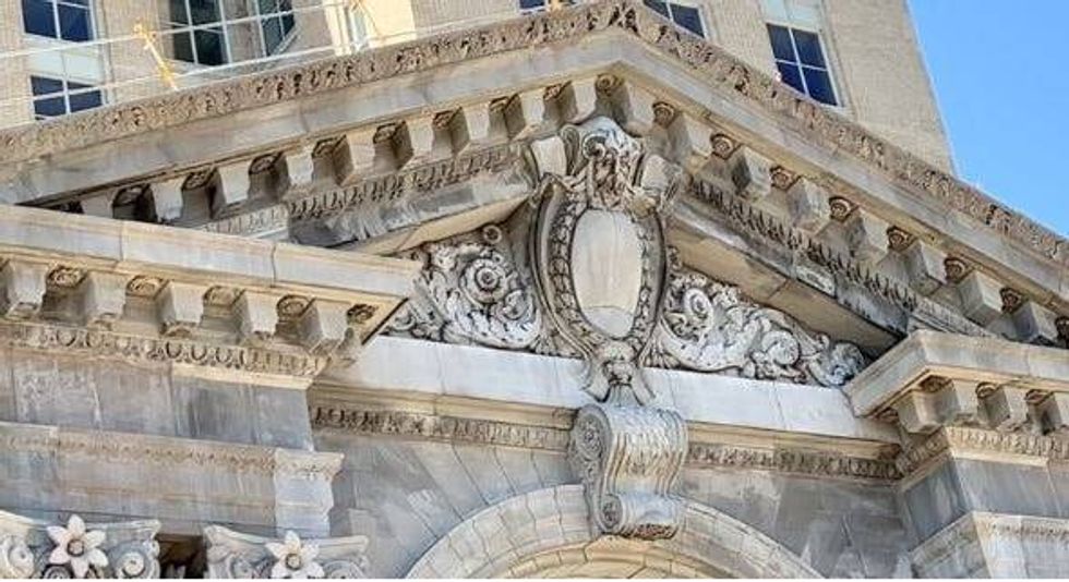 Restored column on the front of the station