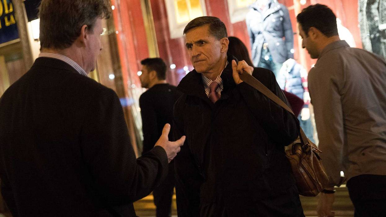 Retired Lt. Gen. Michael Flynn (C) leaves Trump Tower, November 14, 2016 in New York City. Trump is in the process of choosing his presidential cabinet as he transitions from a candidate to the president-elect.