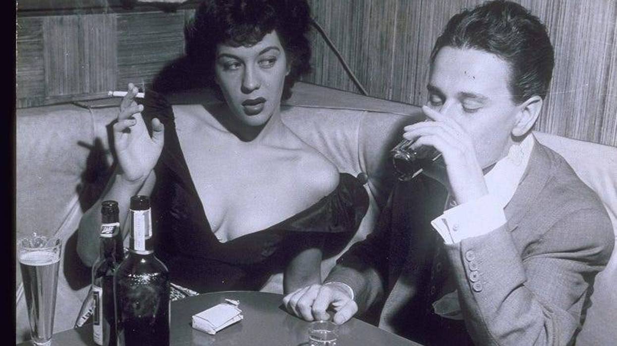 retro photo of couple drinking at a bar