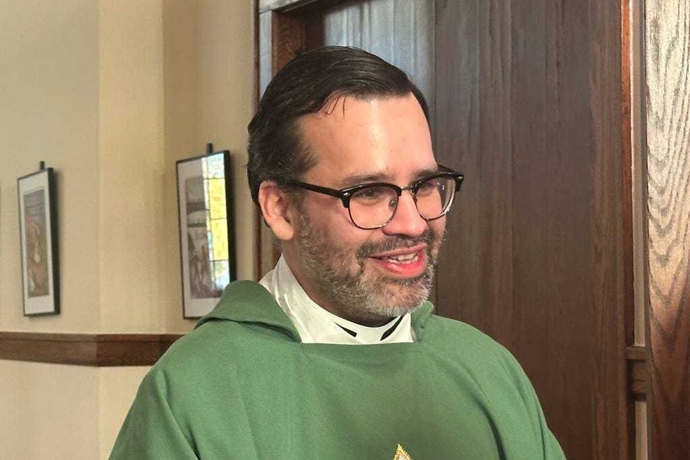 Rev. Hierald Osorto speaks to congregants after services at the St. Paul