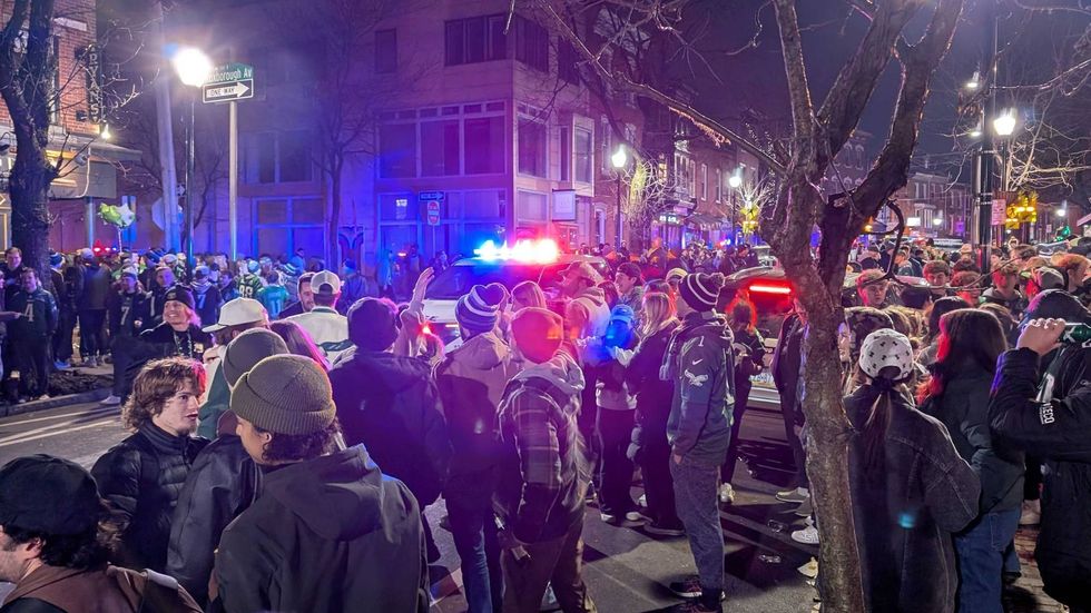 Revelers take to Main Street in Manayunk