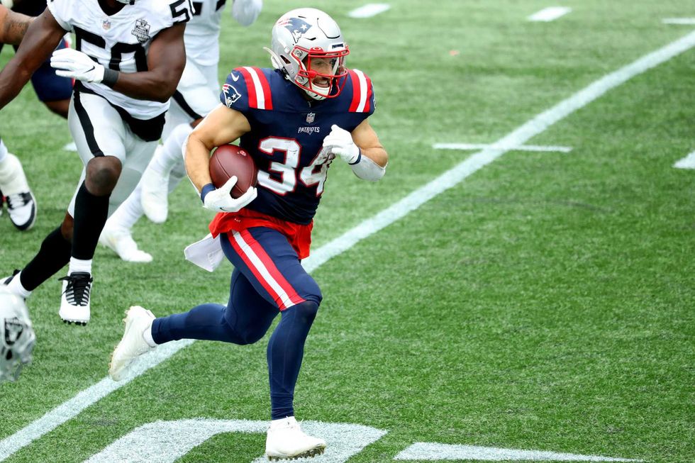 Rex Burkhead breaks loose for a big gain.