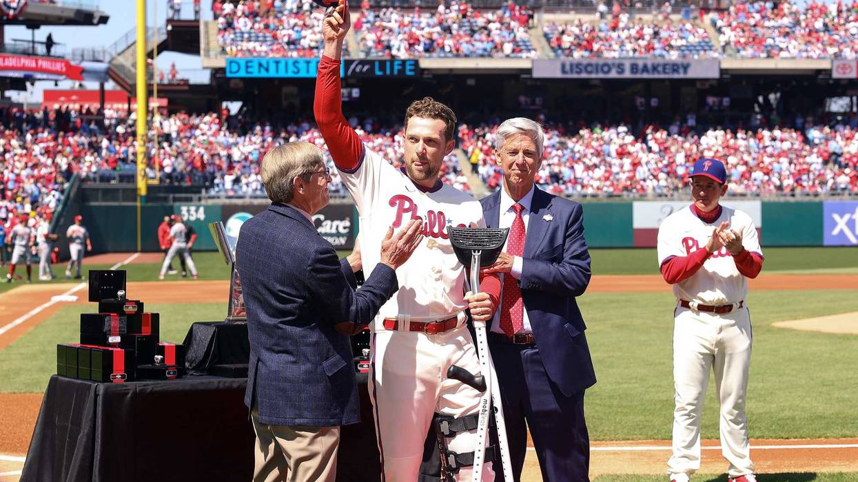 Rhys Hoskins, #17 outfield of the Philadelphia Phillies, receives his 2022 National League Champion ring at Citizens Bank Park on April 9, 2023, in Philadelphia, Pennsylvania.