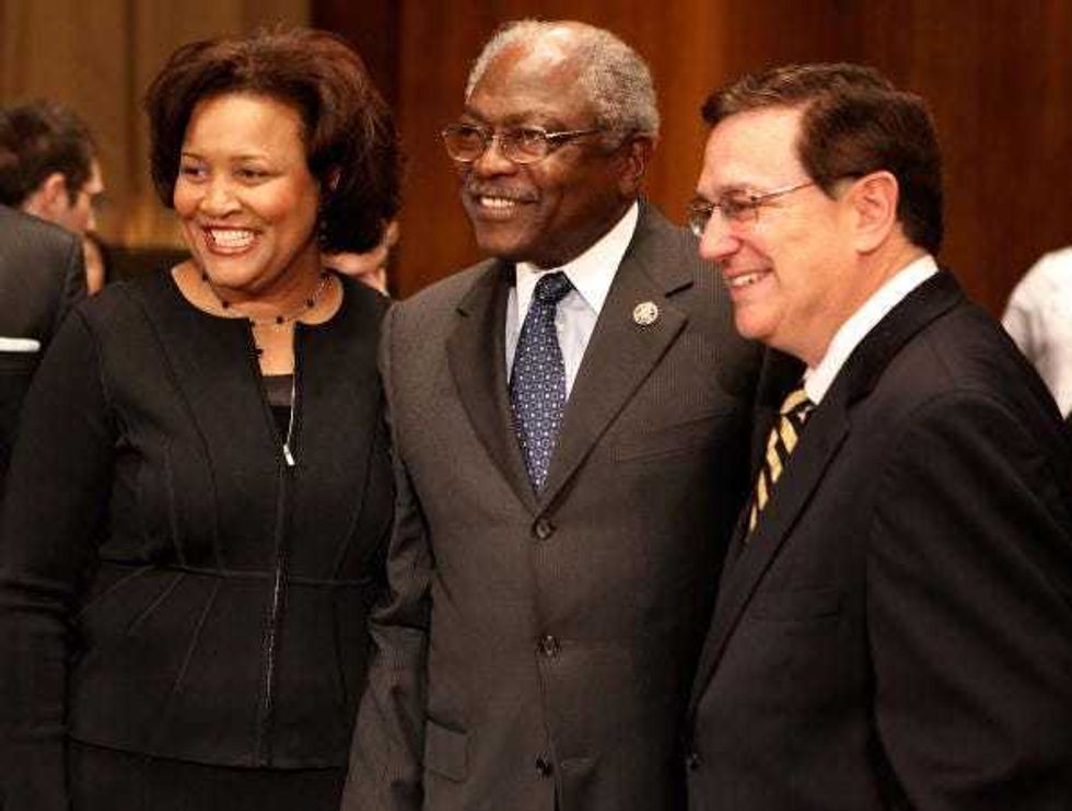 Richard Gergel (R) and J. Michelle Childs (L) pose for photographs with House Majority Whip Rep. James Clyburn (D-SC)