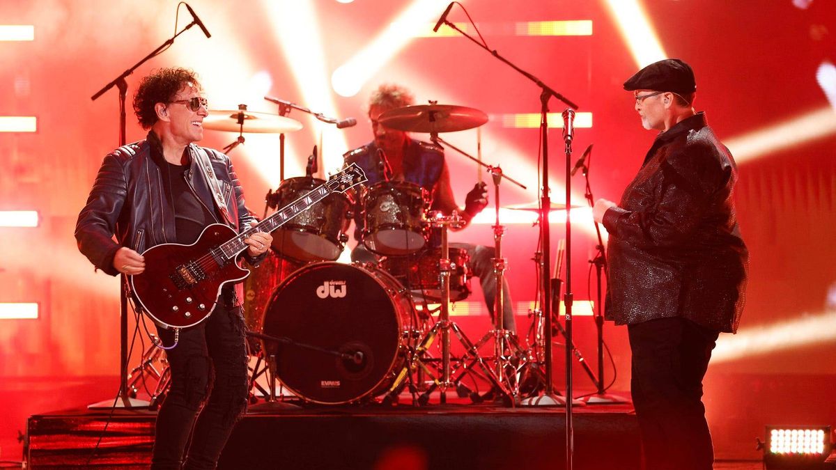 Richard Goodall with Members of Journey Neal Schon and Deen Castronovo