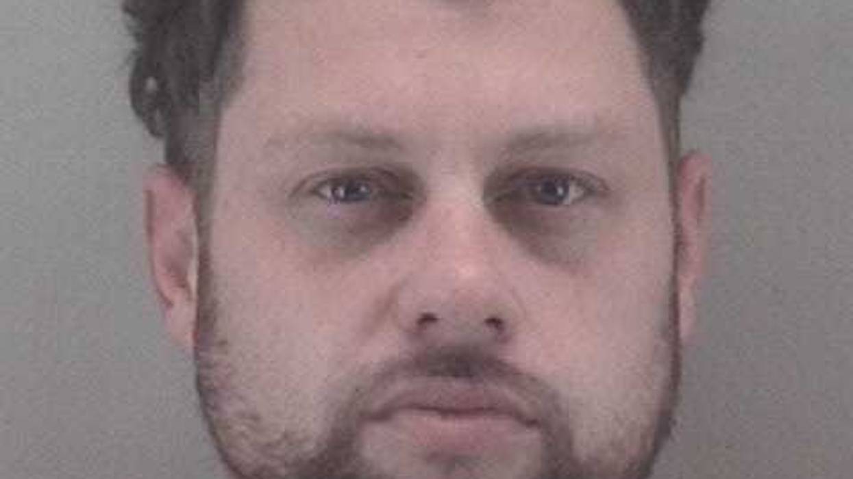 Richmond Police arrest man for racist graffiti sprayed on a West Broad business wall. (Photo Credit: Richmond Police)