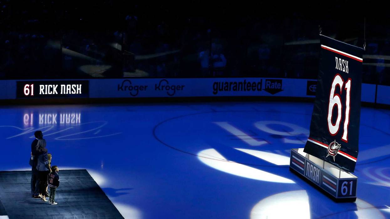 Rick Nash and family watch as his jersey is raised during the jersey retirement ceremony before the game at Nationwide Arena.