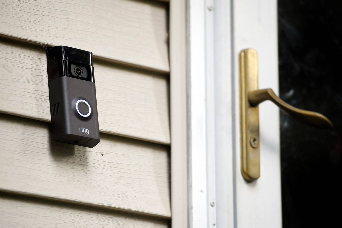 Ring doorbell camera is seen installed outside a home