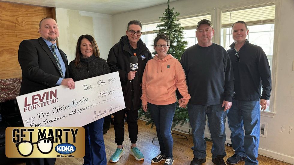 Rita Carini receives $5,000 surprise from Levin