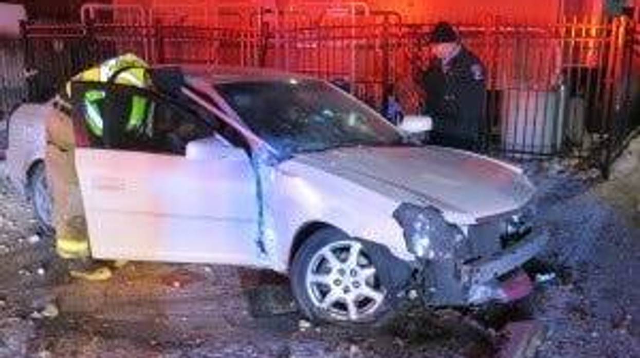 Riverside police investigate a crash Sunday near Riverside Brookfield High School.