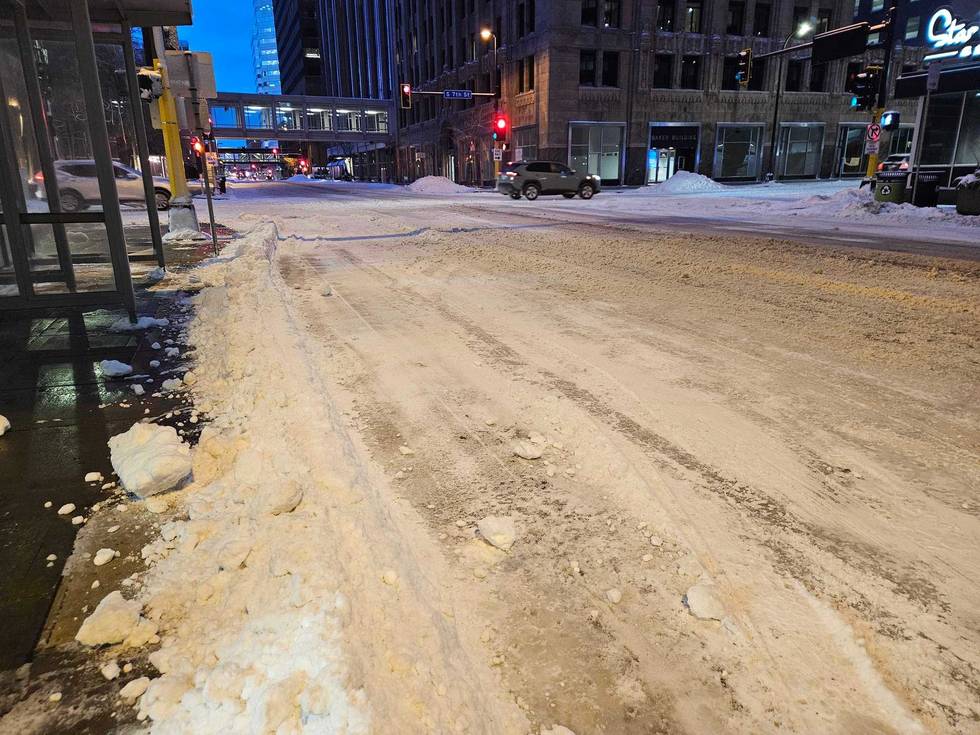 Roads in the Twin Cities are still covered with snow and ice with high winds and drifting making it difficult to get them clear Monday morning.