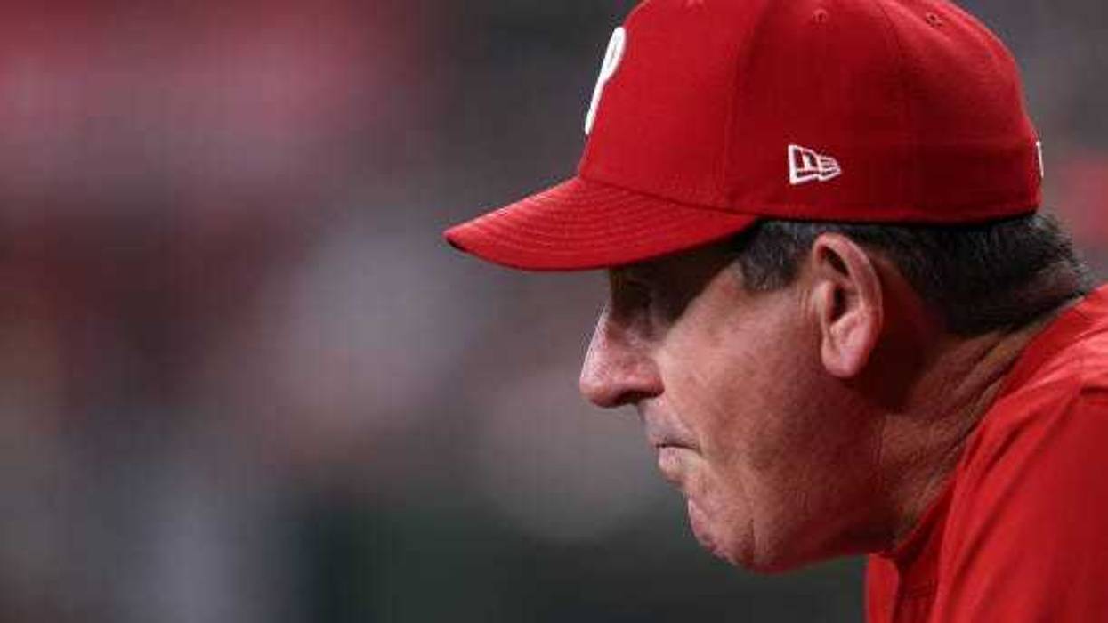 Rob Thomson watches the action during the ninth inning against the Arizona Diamondbacks at Chase Field on August 11, 2024 in Phoenix, Arizona