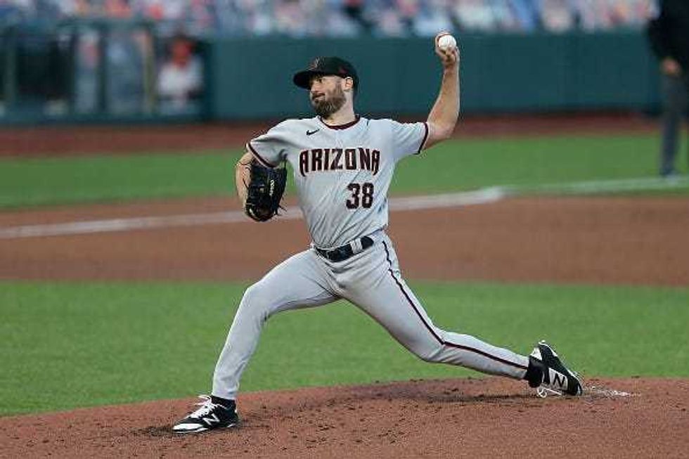Robbie Ray pitches for the Diamondbacks