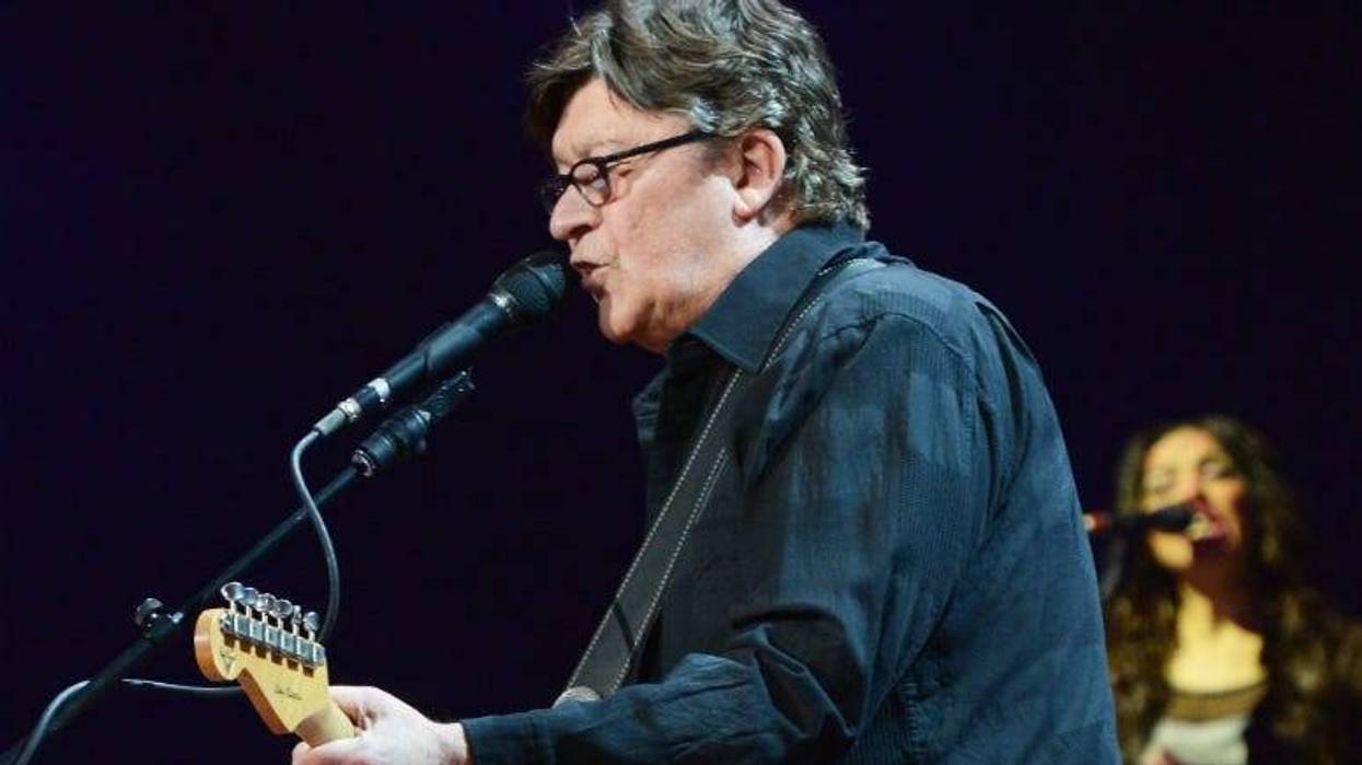 Robbie Robertson performs on stage during the 2013 Crossroads Guitar Festival