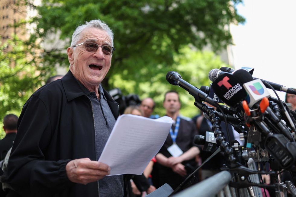 Robert De Niro speaks in support of US President Joe Biden outside of Manhattan Criminal Court as former US President and Republican presidential candidate Donald Trump attends his criminal trial for allegedly covering up hush money payments in New York City, on May 28, 2024.