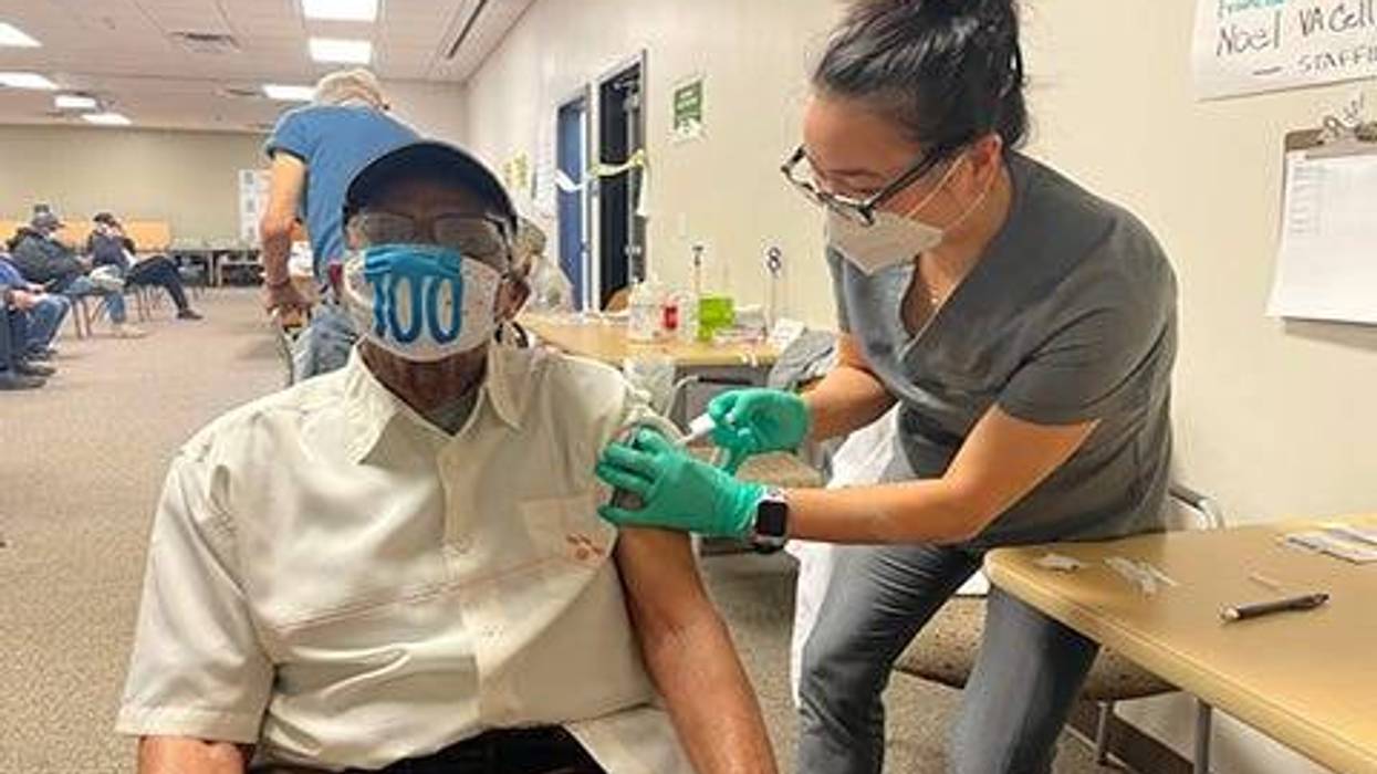 Robert Hays, a 100-year-old U.S. Army veteran, receives his final dose of the COVID-19 vaccination at VA Greater Los Angeles Healthcare System’s (VAGLAHS) West Los Angeles campus on Jan. 29, 2021. Since mid-December of 2020, VAGLAHS has administered more than 25,000 novel coronavirus vaccines to veterans and staff.