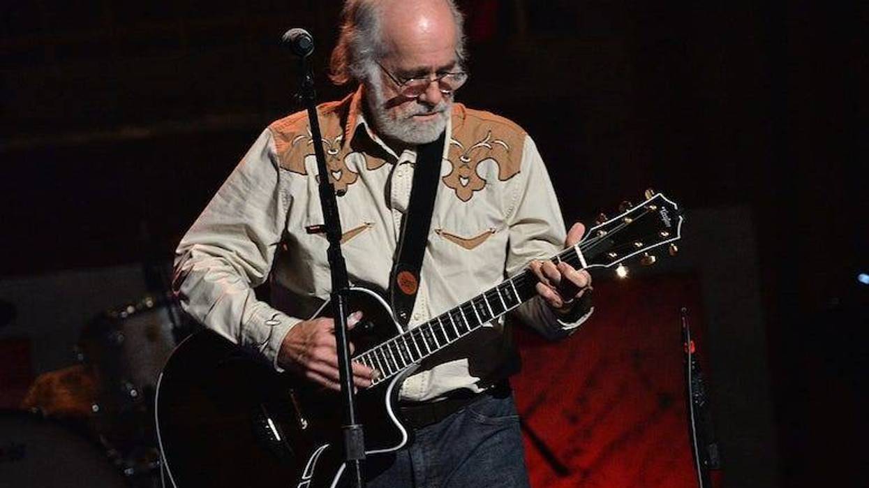 Robert Hunter performs in concert. The Grateful Dead lyricist has died at the age of 78.