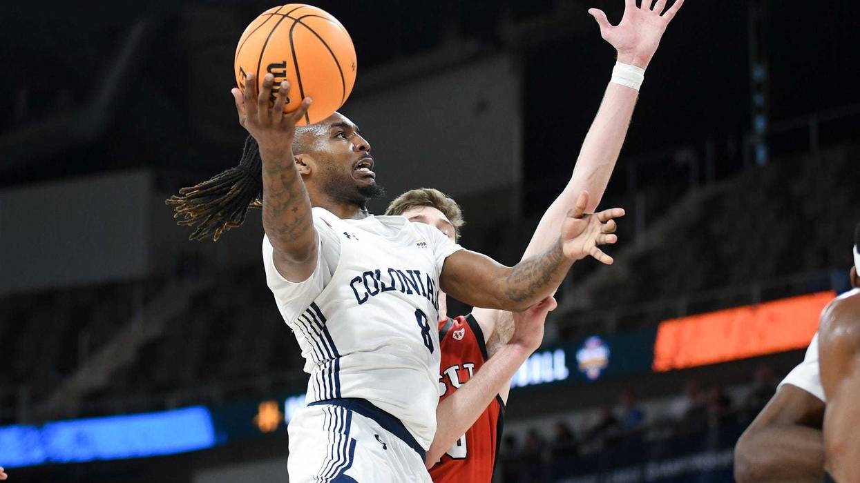 Robert Morris layup by Kam Woods