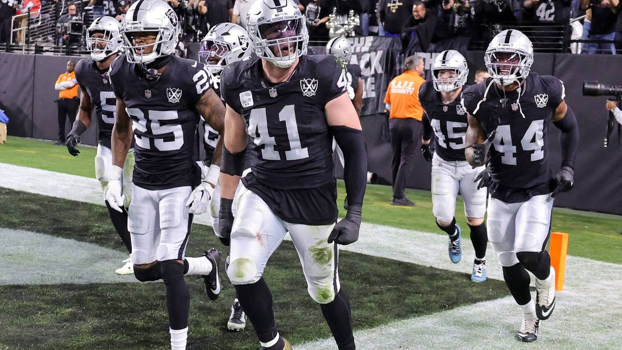 Robert Spillane #41 of the Las Vegas Raiders celebrates with teammates after intercepting a pass against the Atlanta Falcons in the third quarter of their game at Allegiant Stadium on December 16, 2024 in Las Vegas, Nevada. The Falcons defeated the Raiders 15-9.