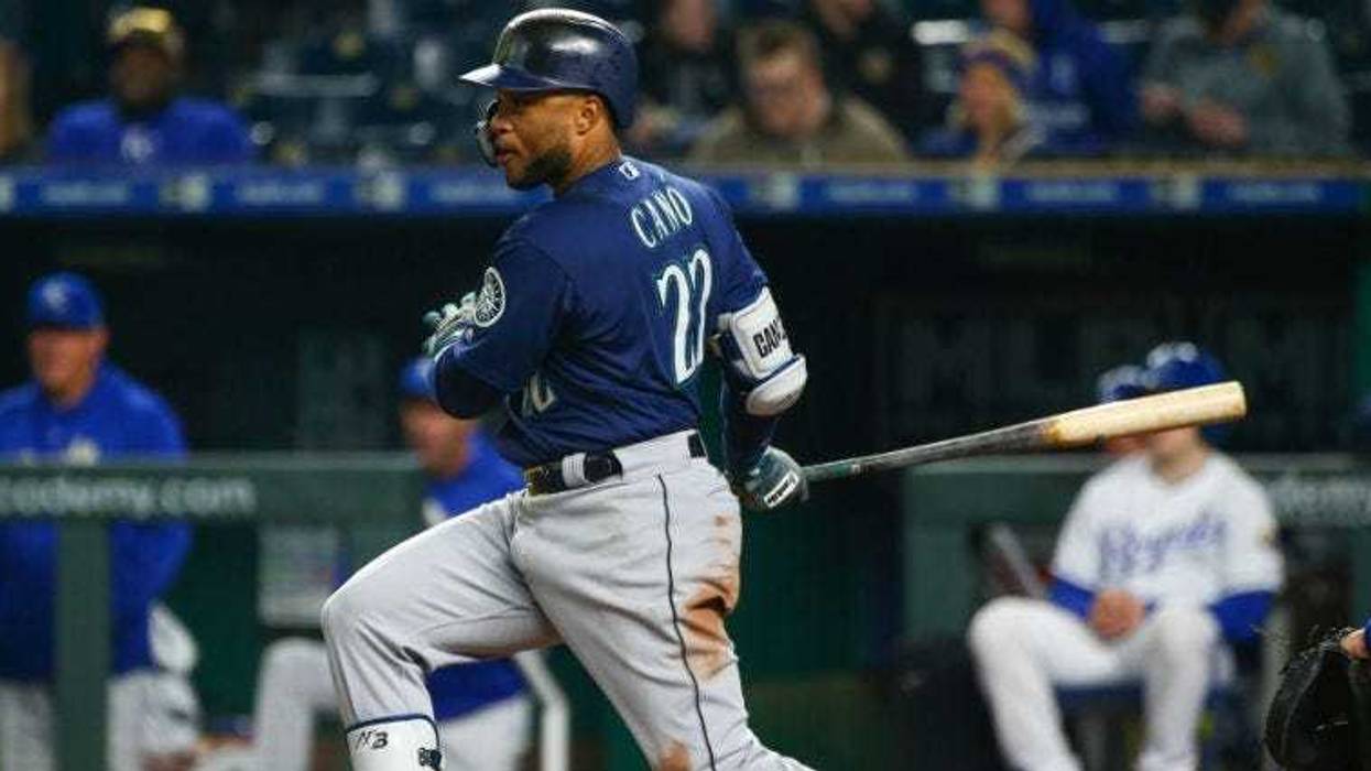 Robinson Cano bats against the Kansas City Royals in the eighth inning at Kauffman Stadium in Kansas City.