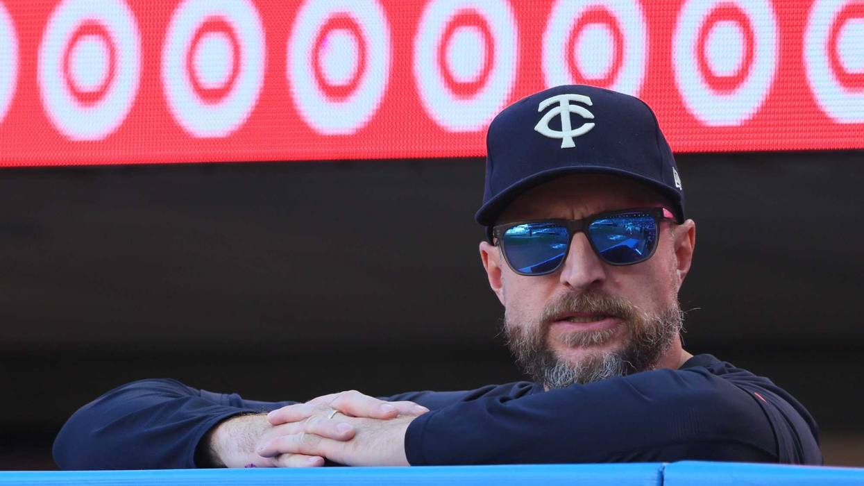 Rocco Baldelli #5 of the Minnesota Twins looks on from the dugout in the ninth inning against the Baltimore Orioles at Target Field on September 29, 2024 in Minneapolis, Minnesota. The Baltimore Orioles defeated the Minnesota Twins 6-2.