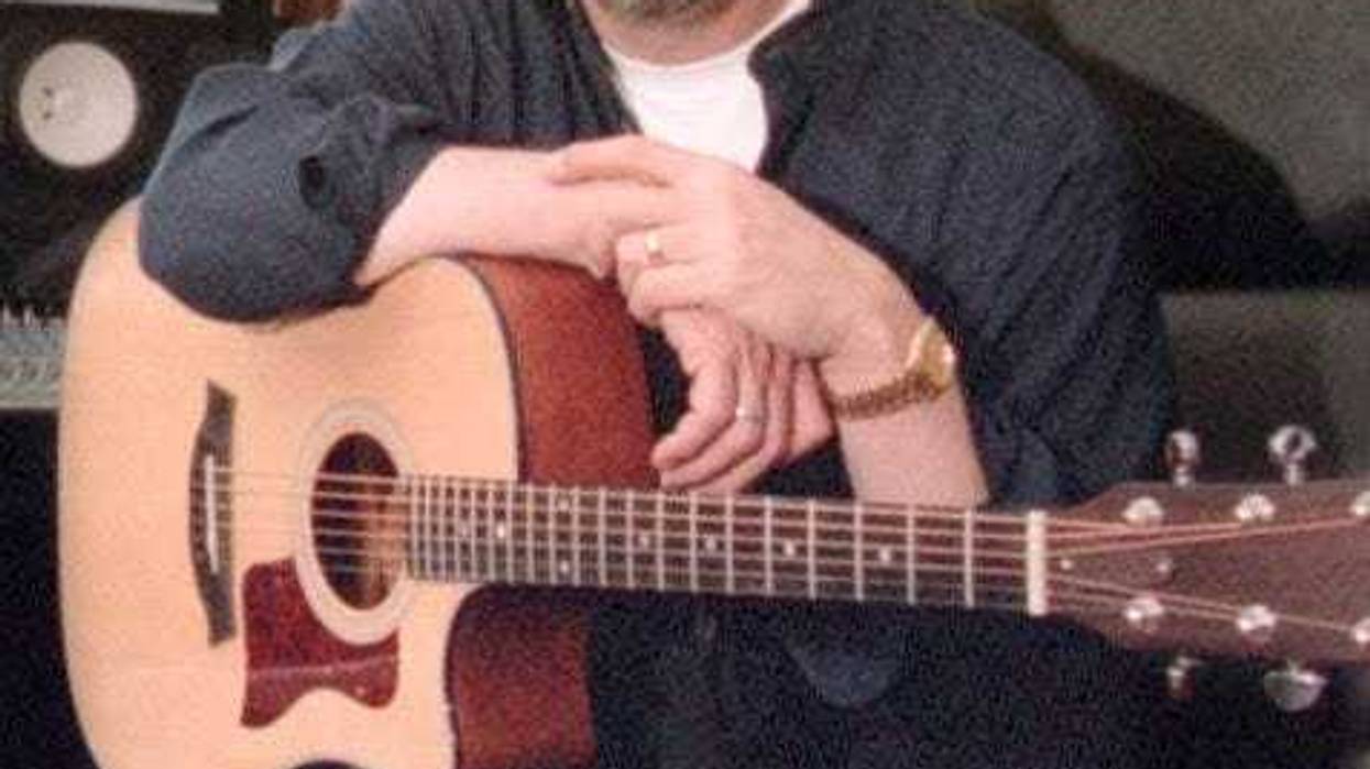 Rocker Michael Stanley poses in his Bainbridge home studio in 1998.