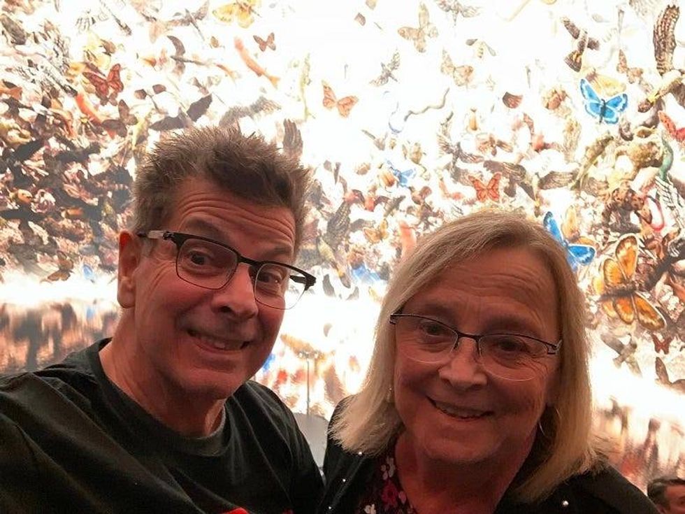 Rocky & Sue with U2 concert backdrop
