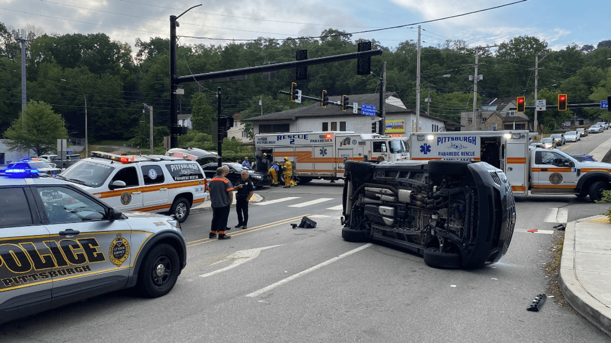 Rollover accident with entrapment on Banksville Road