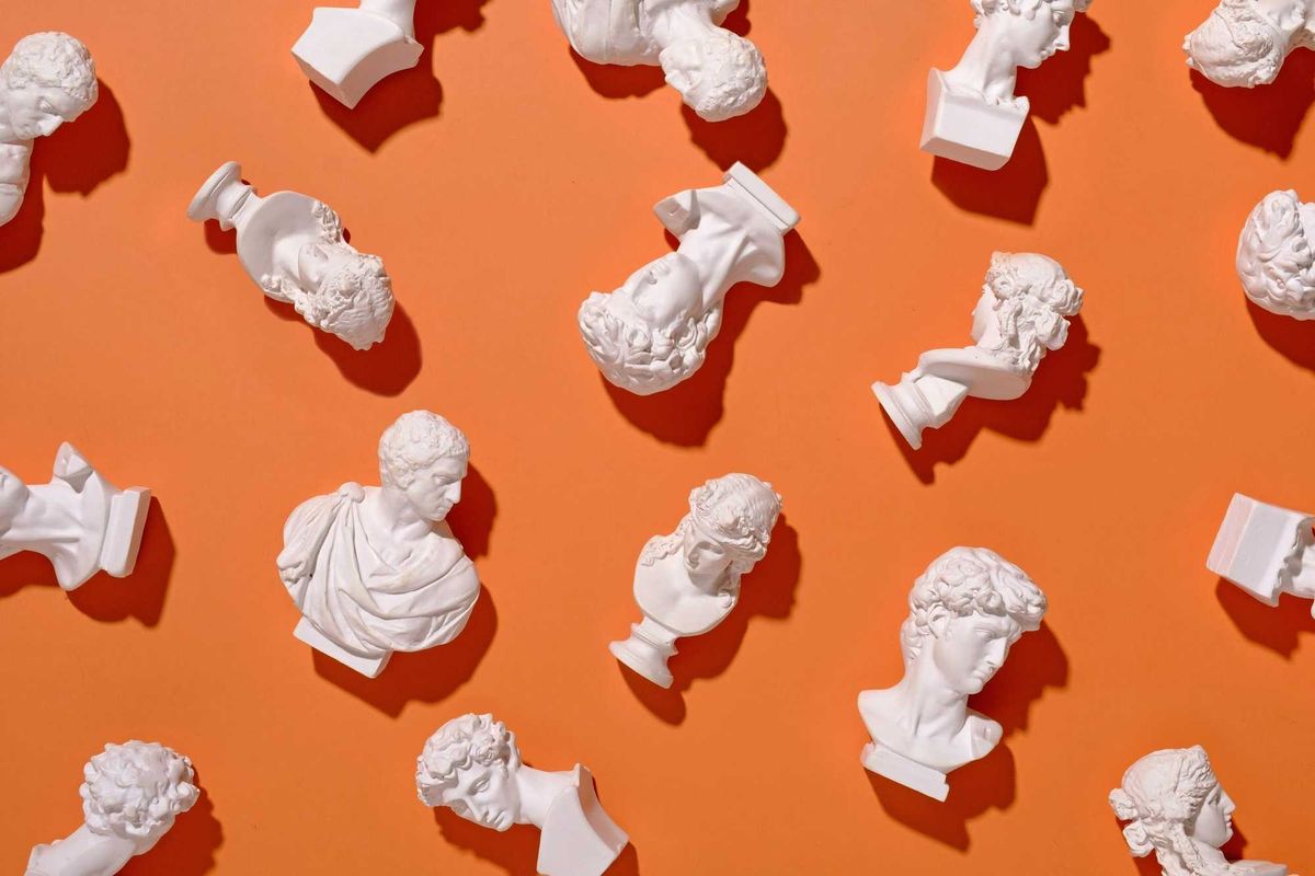 Roman busts on an orange background artwork.