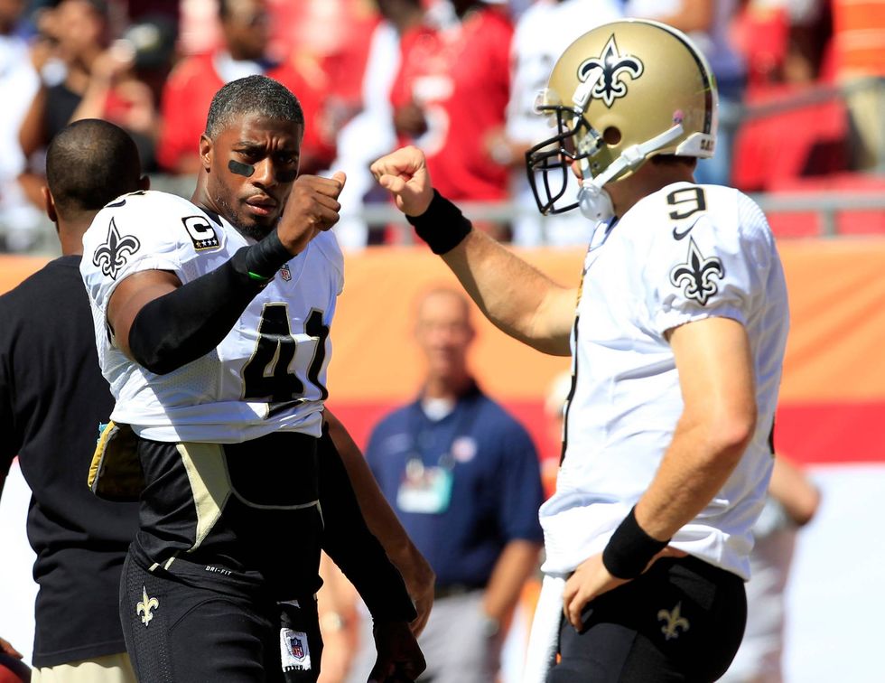 Roman Harper, Drew Brees