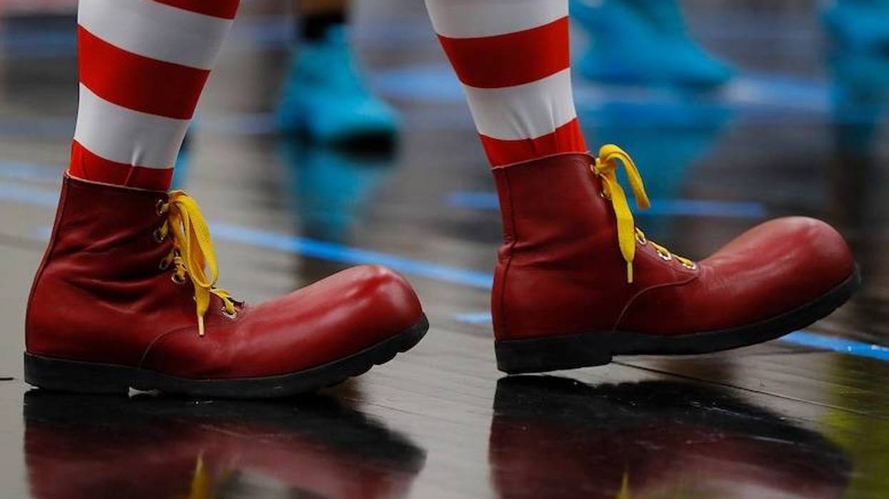 Car shaped like Ronald McDonald’s boot seen driving down the highway in Texas