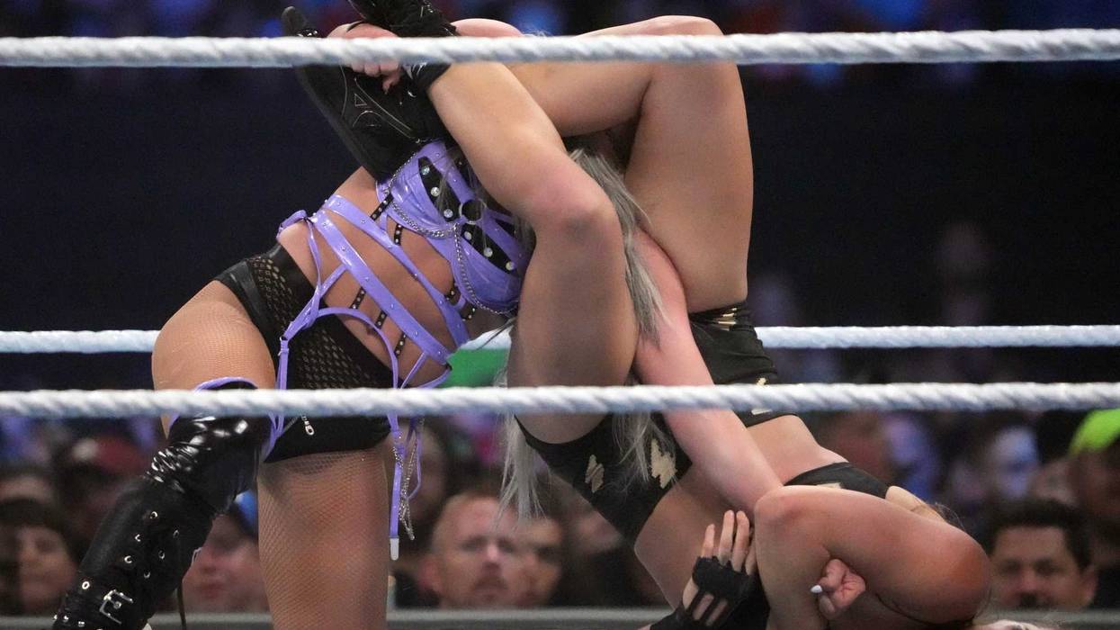 Ronda Rousey (right) and Liv Morgan battle for the SmackDown Women's Championship at SummerSlam 2022 in Nashville, Tennessee.