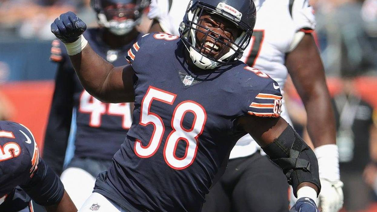 Roquan Smith #58 of the Chicago Bears celebrates a sack against Joe Burrows of the Cincinnati Bengals at Soldier Field on September 19, 2021 in Chicago, Illinois. The Bears defeated the Bengals 20-17.