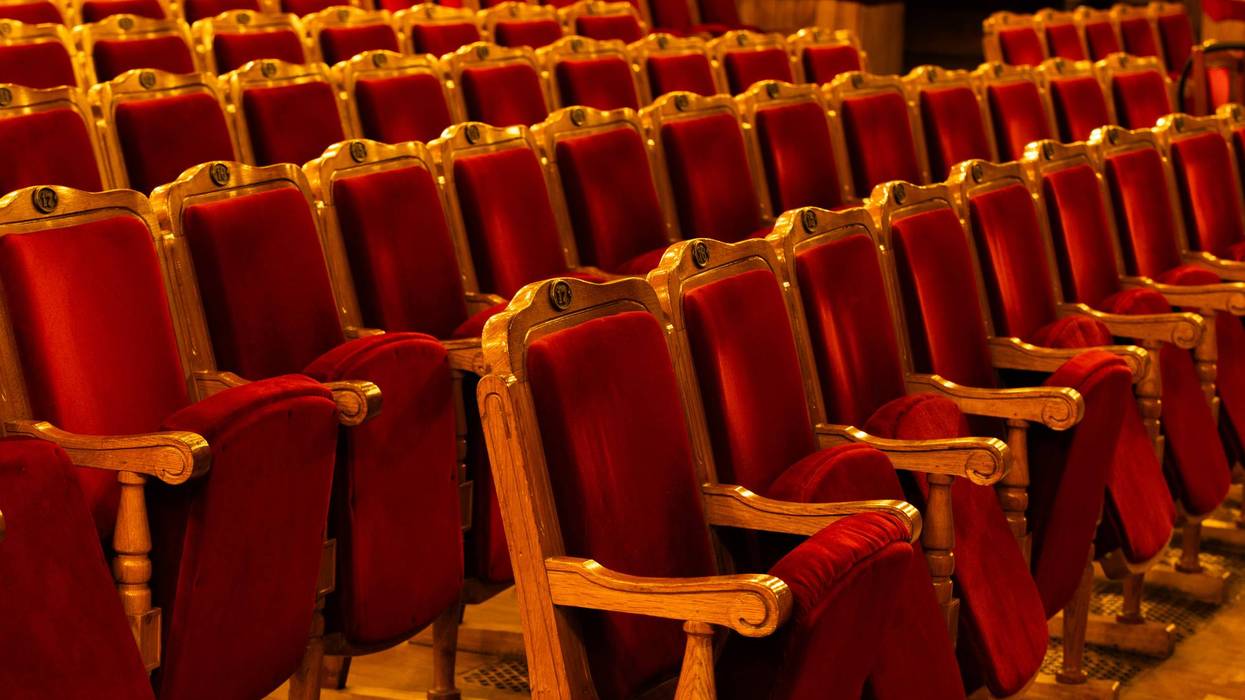 Row of red seats in theatre