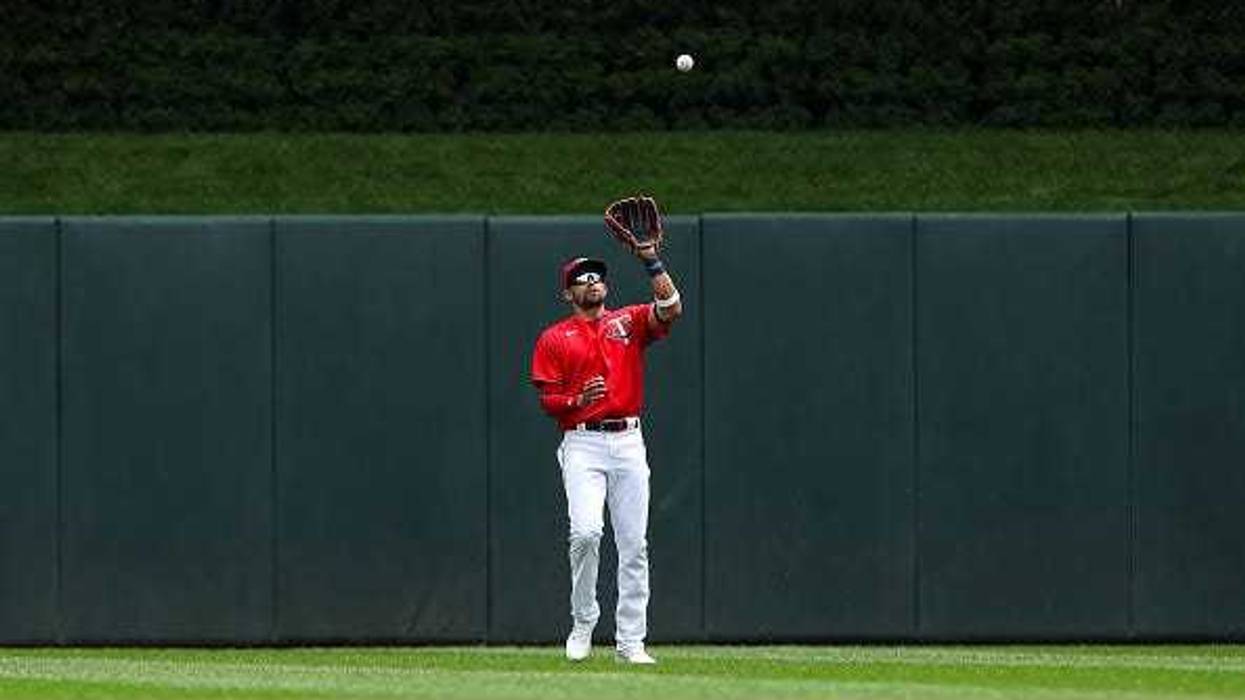 Royce Lewis #23 of the Minnesota Twins catches a fly ball hit by Andrew Benintendi #16 of the Kansas City Royals for an out in the first inning of the game at Target Field on May 29, 2022 in Minneapolis, Minnesota.