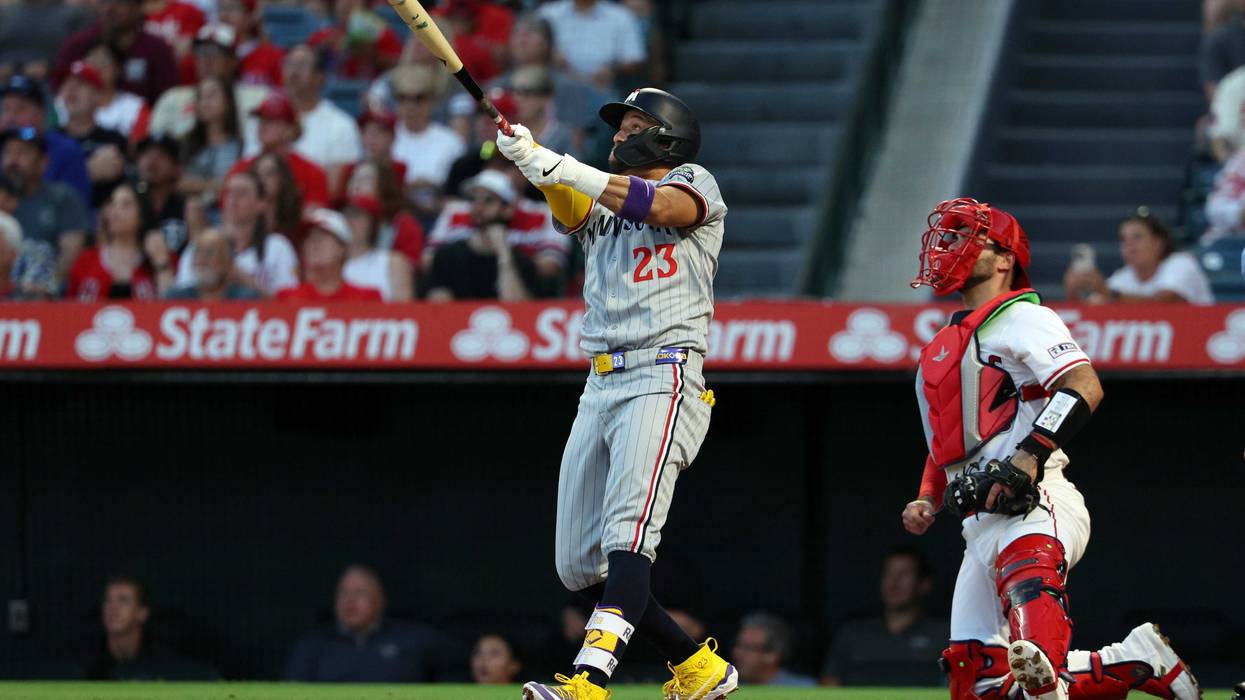 Royce Lewis #23 of the Minnesota Twins hits a two-run home run against pitcher Caden Dana #36 of the Los Angeles Angels during the second inning at Angel Stadium of Anaheim on September 8, 2025 in Anaheim, California.