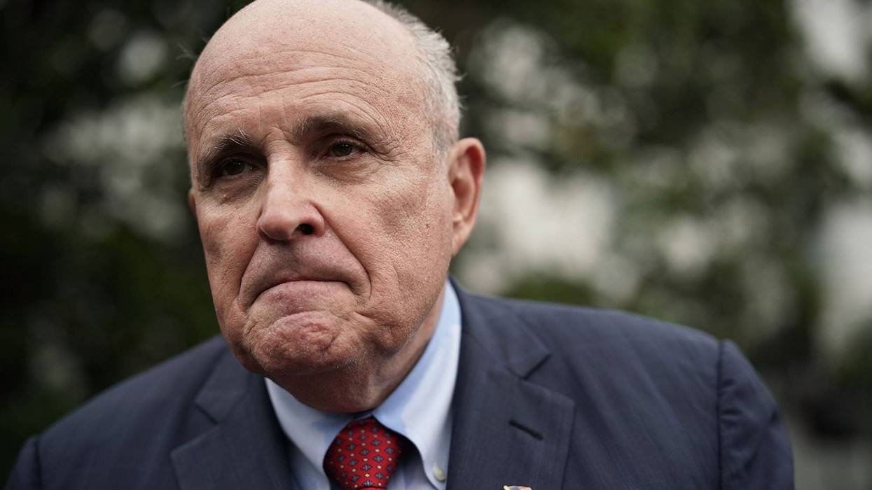Rudy Giuliani, former New York City mayor and current lawyer for U.S. President Donald Trump, speaks to members of the media during a White House Sports and Fitness Day at the South Lawn of the White House May 30, 2018 in Washington, DC.
