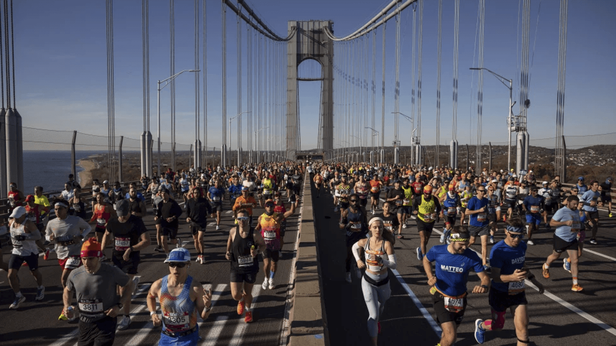Runners cross the Verrazzano-Narrows Bridge at the start of the New York City Marathon, Sunday, Nov. 3, 2024, in New York.