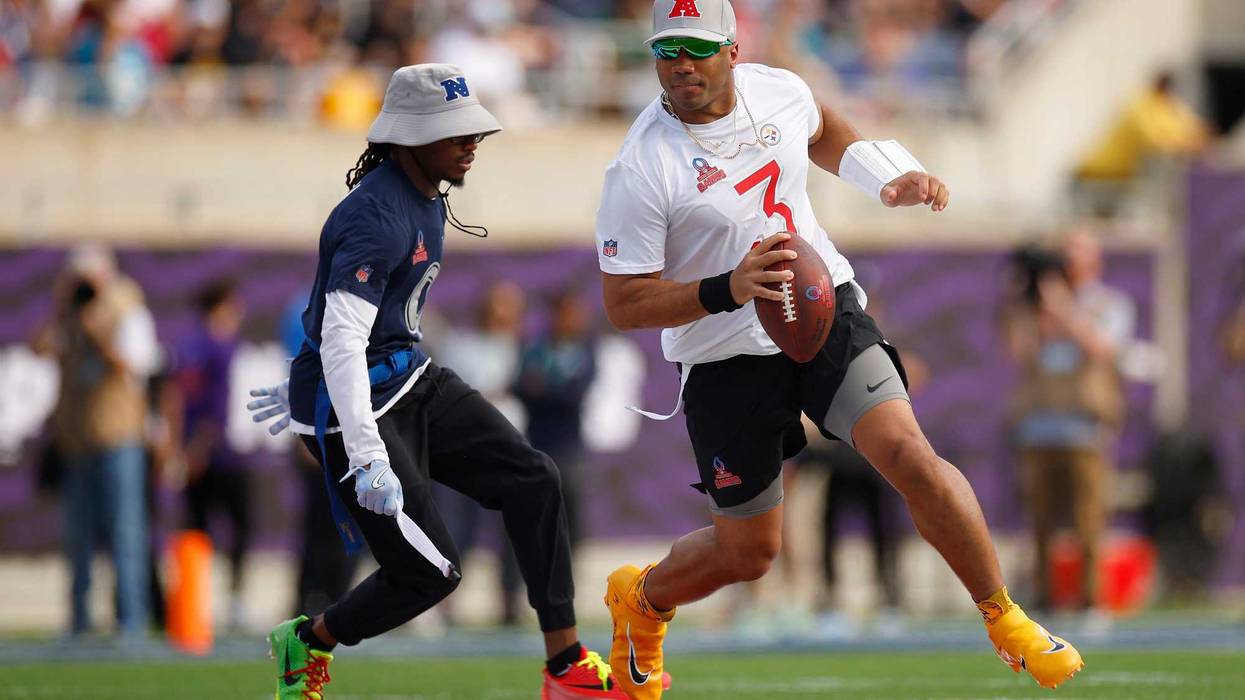 Russell Wilson #3 of the Pittsburgh Steelers is sacked by KaVontae Turpin #9 of the Dallas Cowboys during the second quarter in the NFL Pro Bowl Games at Camping World Stadium on February 02, 2025 in Orlando, Florida.
