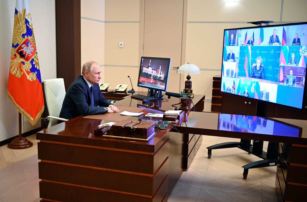 Russian President Vladimir Putin chairs a Security Council meeting via videoconference at the Novo-Ogaryovo residence outside Moscow, Russia, Thursday, March 3, 2022