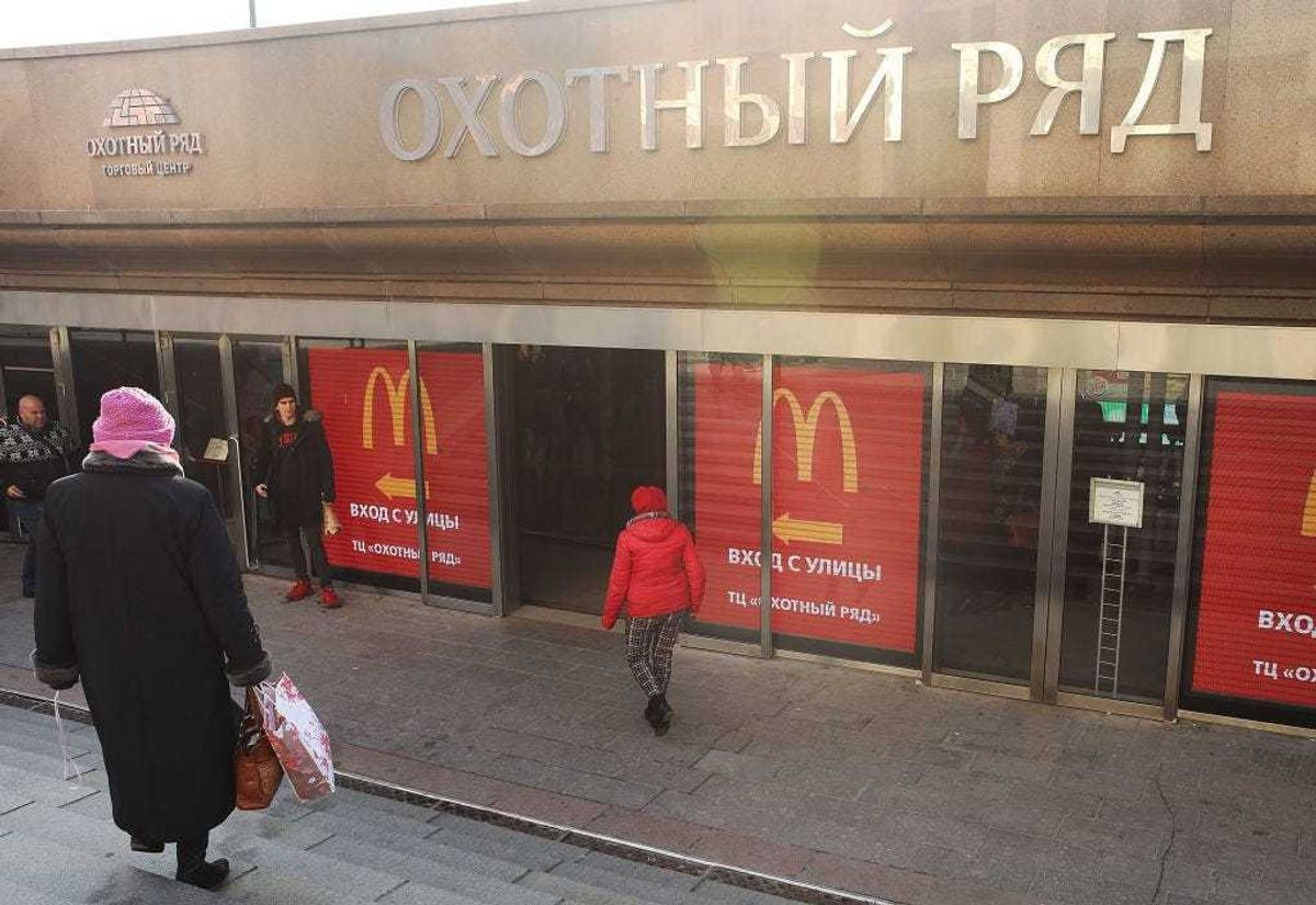 Russians walk into a McDonald's restaurant in Moscow on March 7, 2017 in Moscow, Russia.
