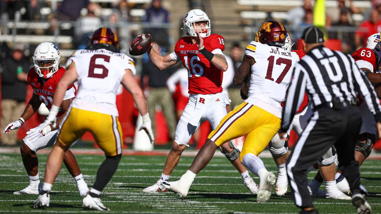 Rutgers Scarlet Knights quarterback Athan Kaliakmanis (16) drops back to pass during the first half against the Minnesota Golden Gophers at SHI Stadium in 2024.