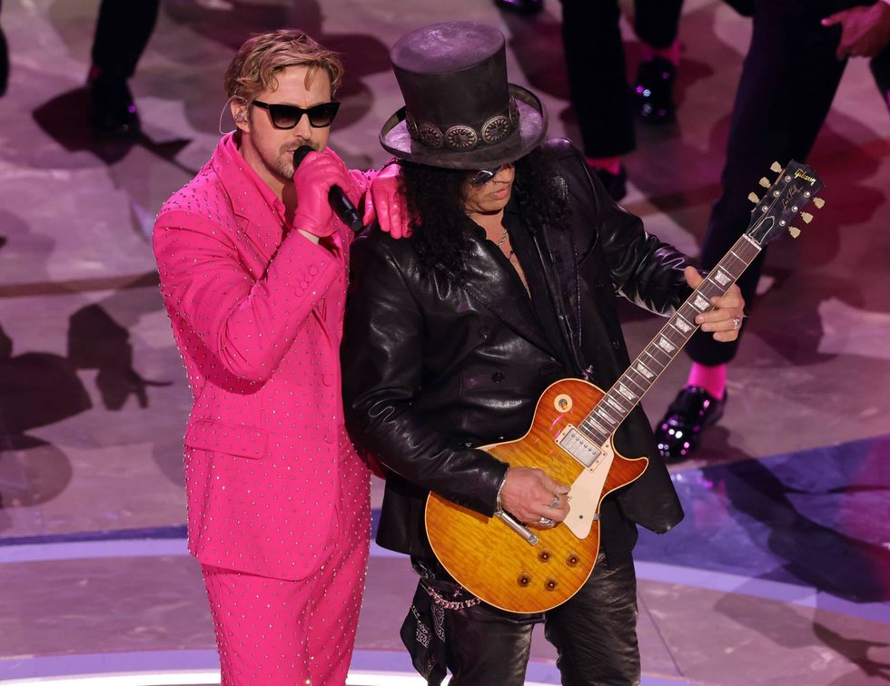 Ryan Gosling and Slash perform