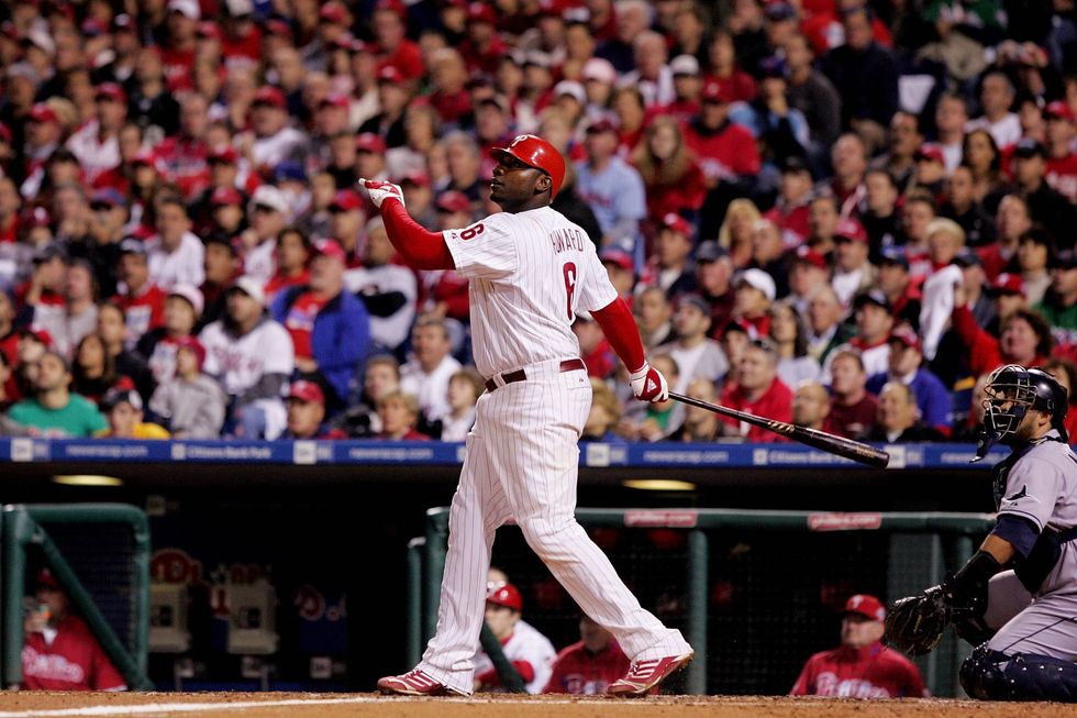 Ryan Howard #6 of the Philadelphia Phillies hits a three-run home run against Andy Sonnanstine of the Tampa Bay Rays during game four of the 2008 MLB World Series on October 26, 2008 at Citizens Bank Park in Philadelphia, Pennsylvania.