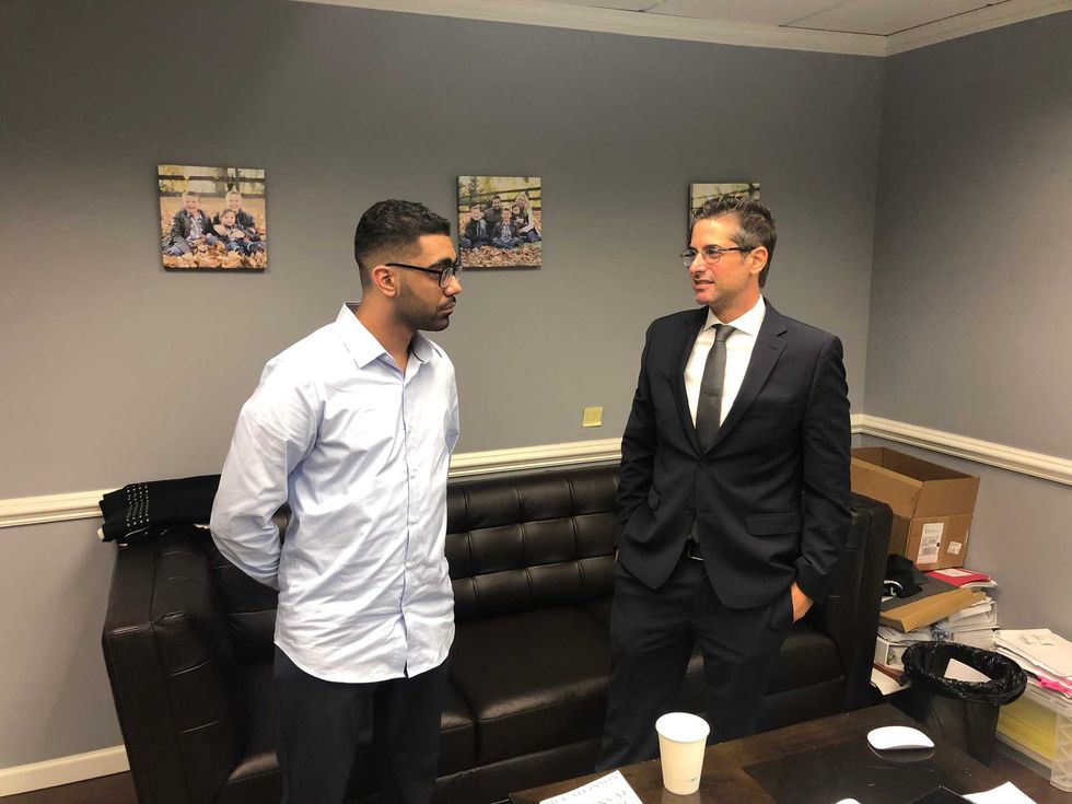 Ryan Pacheco, left, with attorney Jon Bell.